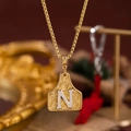 Collana vintage bicolore oro e argento con ciondolo inciso della lettera N in rilievo - Oro N