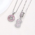 Silver tone necklaces featuring pink ice zircon letter S pendants in two stylish designs - Silver S-Shape