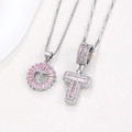Letter T pendant necklace with pink baguette cubic zirconia and sparkling white crystals - Silver T