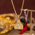 Collana a catena box dorata con ciondolo a forma di etichetta e lettera T argento - Oro T