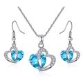 Detailed shot of silver heart jewelry set featuring blue crystals and white pavé stones - Earring Hooks Set / Aqua