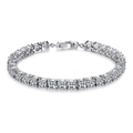 Close-up of elegant tennis bracelet with cubic zirconia in polished white gold plating - Silver