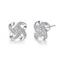 Detailed macro view of silver windmill stud earrings with sparkling cubic zirconia stones - Four-leaf Clover Knot / White
