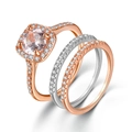 Dettaglio del set di anelli in oro rosa con micro-pavé di zirconi e pietra centrale - Taglia 9 / Set di 3 anelli / Set di 3 / Oro Rosa e Argento