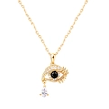 Evil eye pendant necklace with gold metal frame, white zircons, and drop stone - Gold