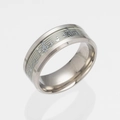 Detailed macro view of silver music note ring with glowing luminous staff pattern - Nocturnal Silver
