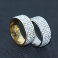 Macro shot showing iced-out Cuban rings in gold and silver with rows of pavé crystals - US 6 / Gold
