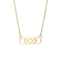 Close-up of golden concentric knot pendant necklace with minimalist geometric link chain - Gold