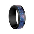 Macro detail of men's black dragon ring with blue Celtic knot inlay and matte steel finish - Black with Blue Background