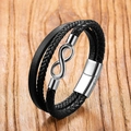 Detailed macro view of multi-layer black leather bracelet with silver infinity symbol charm - 19cm / Infinity Symbol Style (Style 4)