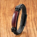 Macro detail of men's black braided leather bracelet with red-brown gemstone and metal clasp - Indian Agate A