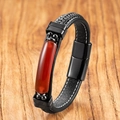 Detailed close-up of woven black leather men's bracelet with a red stone inlay and magnetic clasp - Red Agate