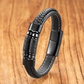 Close-up of black braided leather bracelet with volcanic rock beads and magnetic clasp - Lava Stone - Black Clasp
