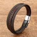 Multi-layer woven leather bracelet with magnetic stainless steel clasp on wood background - Dark Brown Braided Cord With Silver Black Clasp