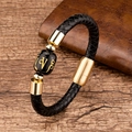 Detail of woven leather bracelet with gold magnetic clasp and inscribed black bead - Six-word Mantra / Gold
