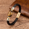 Macro detail of men's braided leather bracelet with golden tiger eye stone and polished clasp - Tiger Eye (Gold-11) / Gold