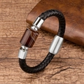 Detailed close-up of men's black braided leather bracelet with square tiger eye stone - Square Tiger Eye / Silver