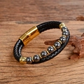 Close-up of double-layer black braided leather bracelet with grey stone beads and gold magnetic clasp - Hematite Style (Style-G)