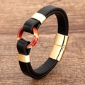 Close-up of woven leather bracelet with red agate bead and gold magnetic clasp on wood - Gold-A (Red Orange Ring)