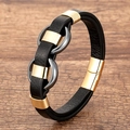 Detail of men's leather bracelet with nested gray rings and gold magnetic clasp on wood - Infinity Symbol Interlocking Rings Design (Style-4)