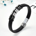 Macro shot of black braided leather bracelet with engraved square metal beads and magnetic clasp - Silver & Black Two-Tone Embossed Polka Dot Style 5