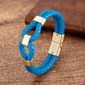 Close-up of blue braided leather bracelet with interlocking gold rings and magnetic clasp - Blue Style (Style-10)