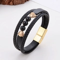 Detail of multilayer braided leather bracelet with rose gold beads and magnetic clasp - Full Black Agate Style