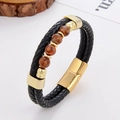 Zweilagiges Lederarmband für Herren mit braunen Perlen und goldenem Magnetverschluss - Braune Mineraltextur