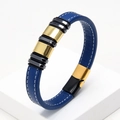 Detail of blue braided leather bracelet with gold and black steel clasp and stitching - Blue Braided Leather with Gold & Black Buckle