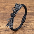 Macro shot of twin metal dragon heads and polished black stone on woven leather strap - Black Round Beads Black Dragon Head Style (Style-7)