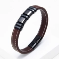 Detail of brown braided leather bracelet with gunmetal charms and white contrast stitching - Brown Leather Gunmetal Ring (Brown-3)