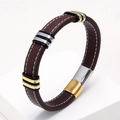 Detalle de pulsera de cuero marrón oscuro con costura blanca y cierre magnético bicolor - Marrón-5
