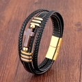 Vista macro del bracciale multistrato in pelle nera con croce dorata e chiusura magnetica - Chiusura Dorata-Croce Marrone