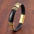 Détail du bracelet en cuir noir avec surpiqûres blanches et fermoir magnétique doré - Pierre Noire - Cuir Noir (Or-1)