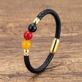 Detail of woven leather bracelet with magnetic clasp and tricolor beads on wood - Black Red Yellow Beads Black Rope (Style-6)
