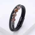 Detail of men's braided leather bracelet featuring brown natural stones and magnetic clasp - Black (Brown Spotted Stone)