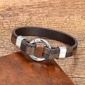 Detail of checkered pattern leather bracelet with silver metal ring clasp on wood - Brown 3