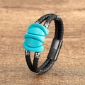 Detail of woven black leather bracelet with blue stone inlay and magnetic clasp - Black-Blue