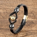 Macro detail of multilayer braided leather bracelet with polished gold and gunmetal beads - Black & Gold