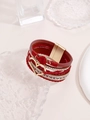 Detalle de pulsera bohemia de cuero rojo multicapa con colgante de corazón y cristales - Rojo