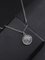 Macro detail of silver stainless steel evil eye pendant with textured edges on jewelry box - Woven Texture Style / Silver