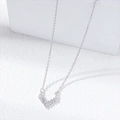 Silver necklace with V-shaped pendant set with baguette-cut cubic zirconia crystals - V-shape Style / Silver