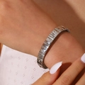 Silver stretch stainless steel bracelet with rhinestones on a wrist close-up view - Horizontal Brushed Style (Style 8)