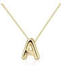 Macro shot of gold balloon-style initial A pendant with polished mirror finish on a chain - Letter A / Gold