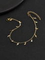Fußkettchen in Gold mit Stern Mond und Blitz Anhängern auf schwarzer Textur - Blitz Stern Mond Stil / Gold