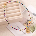 Collana di perline colorate fatta a mano con ciondolo a lettera B dorata stile bohémien - Lettera B