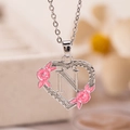 Collana in argento con ciondolo a cuore lettera N e piccoli fiori rosa - Lettera N / Argento
