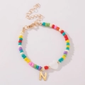 Bohemian kleurrijke kralenarmband met wit hartje en gouden letter N bedeltje - Letter N Stijl (B2504240890)