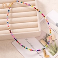 Collana di perline arcobaleno con ciondolo a lettera L dorata e catena regolabile - Lettera L