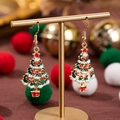 Orecchini ad albero di Natale con ciondolo a forma di regalo su supporto oro - Albero di Natale in vaso con olio gocciolante